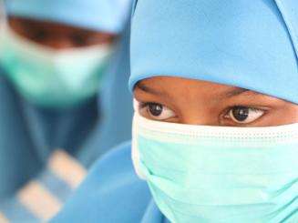 A school girl waits for eye screening in Hudur, Bakool region.