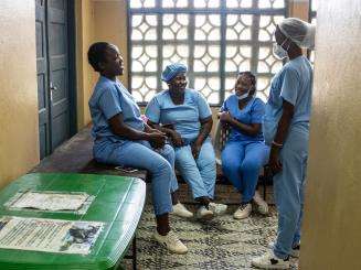 MSF midwives talk with one another at Chingussura health center in Beira, Mozambique.