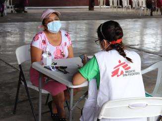 MSF staff meet a patient with chronic kidney disease in Guatemala