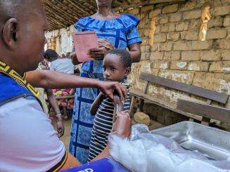 A child is vaccinated for measles in Democratic Republic in Congo. 