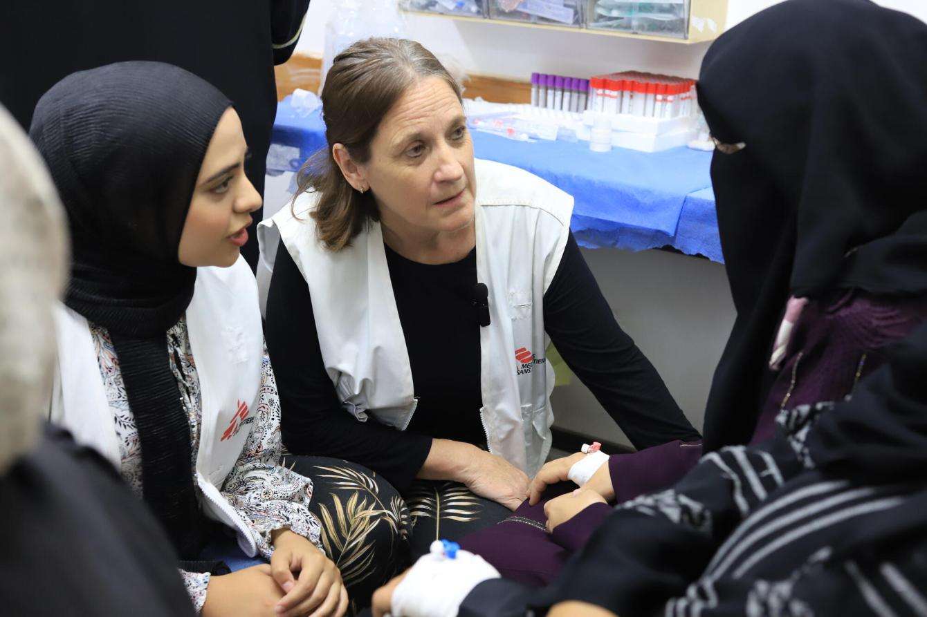 A medical referent speaks with a patient in Nasser Hospital, Gaza.